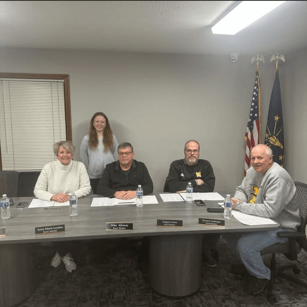 Milan board members congratulate Kayla Roell on her wrestling achievements