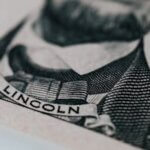 Detailed close-up of Abraham Lincoln's portrait on currency showcasing intricate engraving.